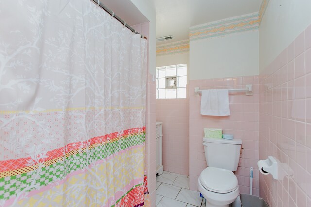 6444 N Oketo Ave, Chicago, IL 60631 - bathroom featuring tile walls, tile patterned flooring, and curtained shower