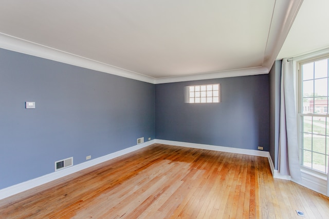 6444 N Oketo Ave, Chicago, IL 60631 - spare room featuring hardwood / wood-style flooring, healthy amount of natural light, and crown molding