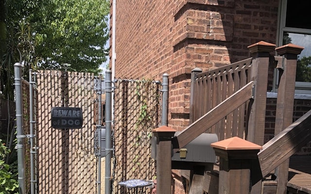 6430 S Lorel Ave, Chicago, IL 60638 - view of side of property with a gate and stairway