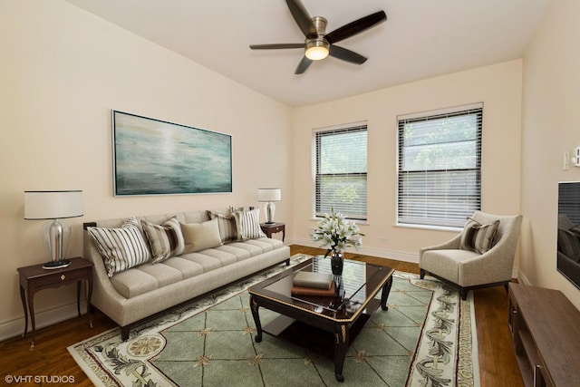1006 E 54th St Unit J-2, Chicago, IL 60615 - living area with ceiling fan and dark wood-style flooring