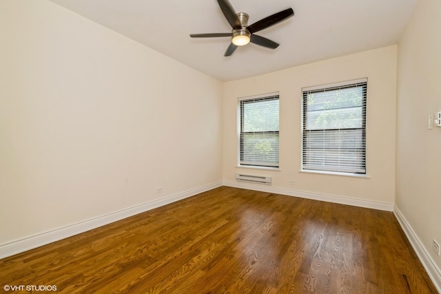 1006 E 54th St Unit J-2, Chicago, IL 60615 - unfurnished room with ceiling fan, wood finished floors, and a wall mounted air conditioner