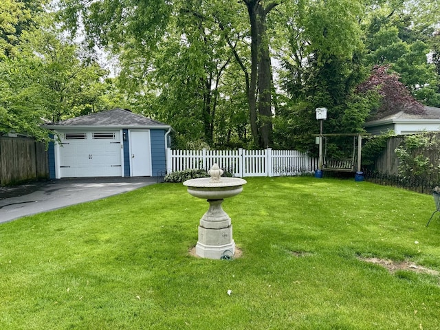 1314 Saint Johns Ave, Highland Park, IL 60035 - view of yard with an outbuilding and a detached garage
