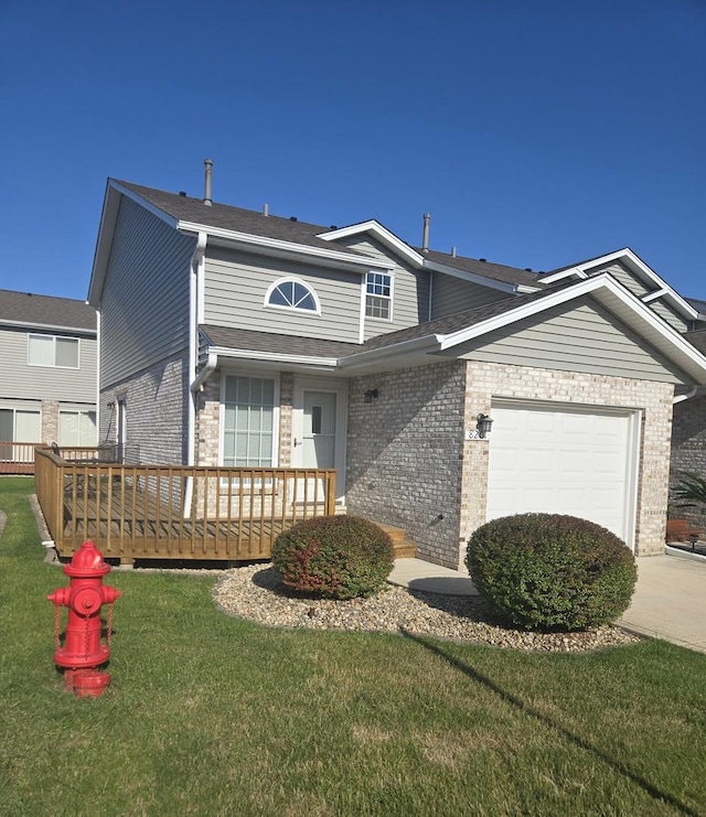 8201 Daniel Dr, Justice, IL 60458 - view of front of property with a garage, brick siding, a front lawn, and driveway