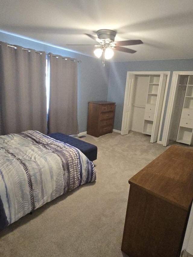8201 Daniel Dr, Justice, IL 60458 - carpeted bedroom with a ceiling fan and multiple closets