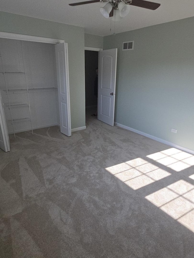 8201 Daniel Dr, Justice, IL 60458 - unfurnished bedroom featuring carpet flooring, a closet, and ceiling fan