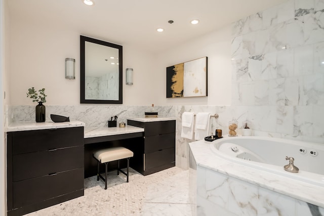 950 N Michigan Ave Unit 4502, Chicago, IL 60611 - bathroom with tile walls, vanity, a whirlpool tub, recessed lighting, and wainscoting