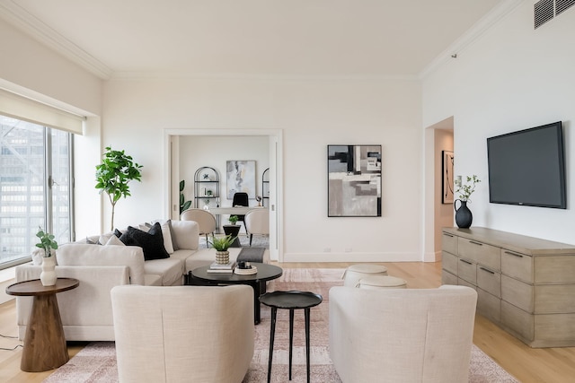 950 N Michigan Ave Unit 4502, Chicago, IL 60611 - living room featuring ornamental molding and light wood-style floors