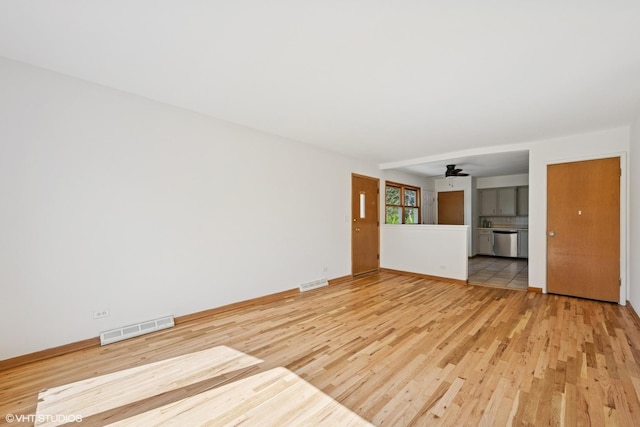 1114 S Mitchell Ave, Arlington Heights, IL 60005 - unfurnished living room featuring light wood-style flooring and a ceiling fan