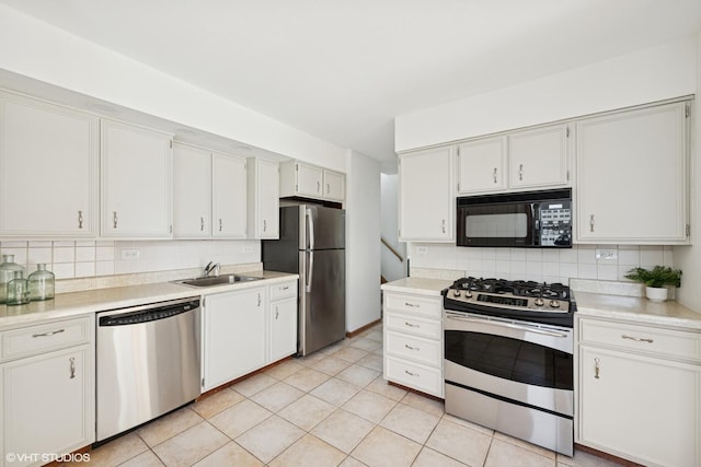 1114 S Mitchell Ave, Arlington Heights, IL 60005 - kitchen featuring stainless steel appliances, tasteful backsplash, and light countertops
