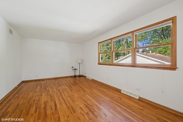 1114 S Mitchell Ave, Arlington Heights, IL 60005 - empty room featuring light wood-style floors and baseboards