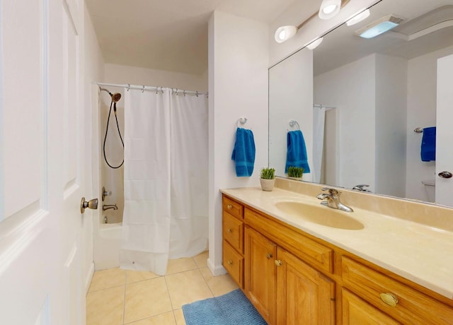 3901 Tallgrass Dr, Champaign, IL 61822 - full bathroom featuring vanity, tile patterned floors, and shower / bath combo with shower curtain