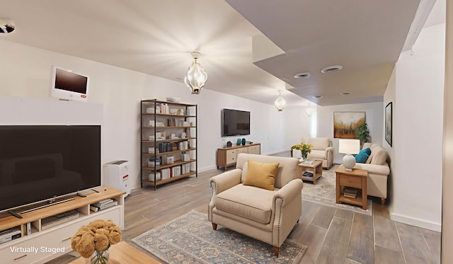 3901 Tallgrass Dr, Champaign, IL 61822 - living room featuring wood finished floors and baseboards