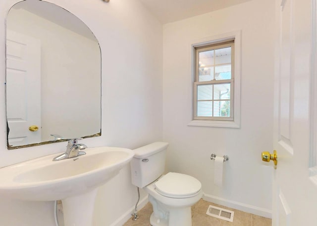 3901 Tallgrass Dr, Champaign, IL 61822 - half bath featuring baseboards and tile patterned floors
