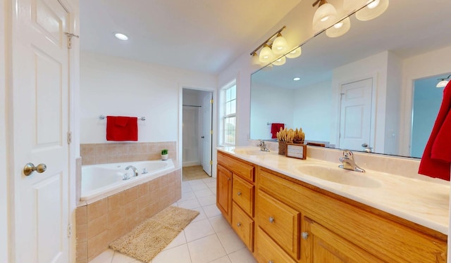 3901 Tallgrass Dr, Champaign, IL 61822 - bathroom featuring tile patterned flooring, double vanity, and a garden tub