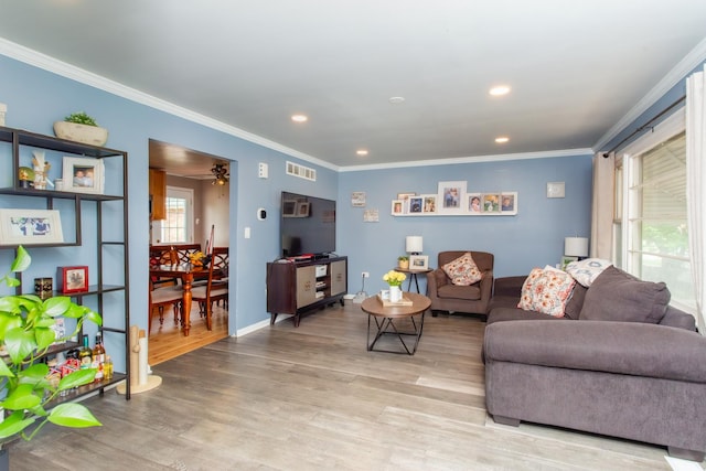 8322 Laporte Ave, Burbank, IL 60459 - living area with light wood-type flooring, ornamental molding, recessed lighting, and ceiling fan