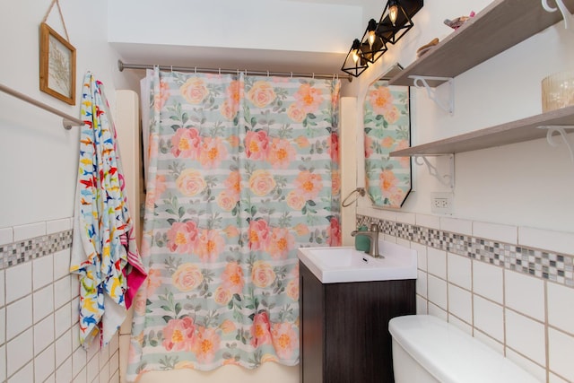 8322 Laporte Ave, Burbank, IL 60459 - bathroom featuring tile walls, vanity, and a shower with shower curtain