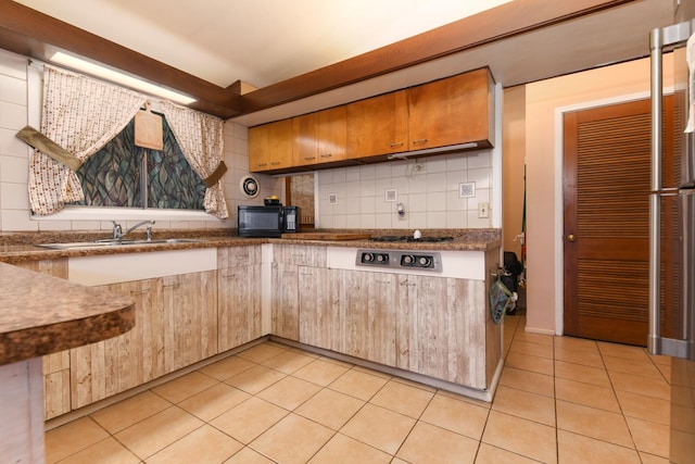 144 Crestwood Dr, East Dundee, IL 60118 - kitchen with black microwave, tasteful backsplash, and light tile patterned floors