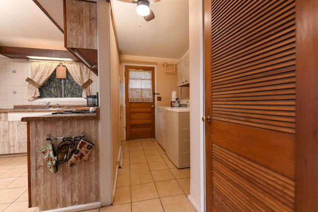 144 Crestwood Dr, East Dundee, IL 60118 - hall with light tile patterned flooring and washing machine and dryer