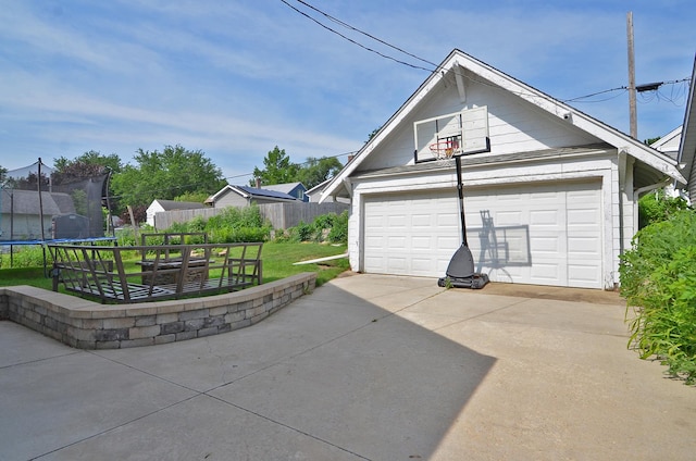 623 Marcy St, Ottawa, IL 61350 - detached garage with a trampoline