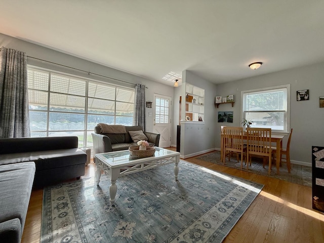 6349 N Olcott Ave, Chicago, IL 60631 - living area featuring healthy amount of natural light and wood finished floors