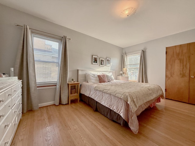 6349 N Olcott Ave, Chicago, IL 60631 - bedroom featuring light wood-style floors and baseboards