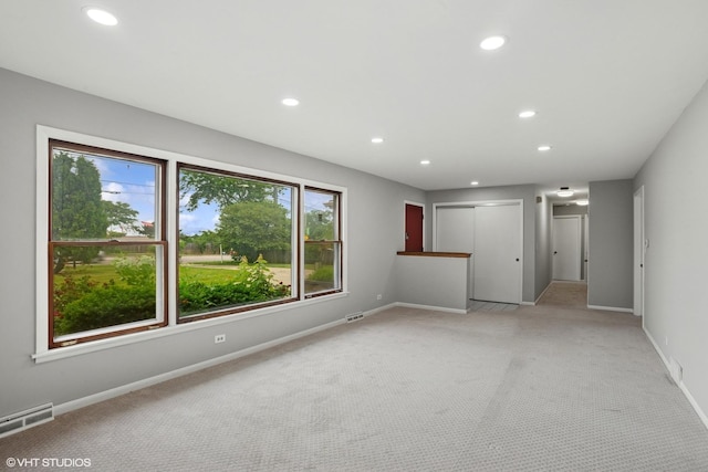 33 W Wise Rd, Schaumburg, IL 60193 - spare room featuring recessed lighting and light carpet