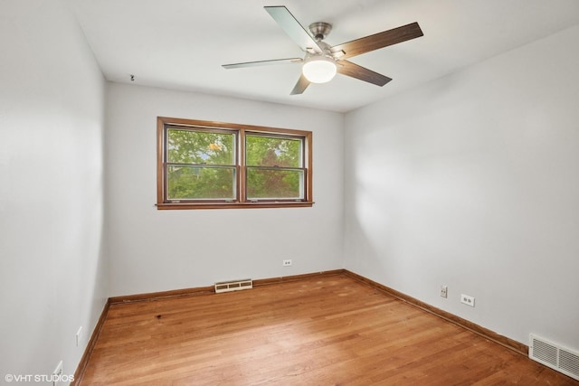 33 W Wise Rd, Schaumburg, IL 60193 - unfurnished room featuring a ceiling fan and light wood finished floors