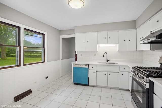 33 W Wise Rd, Schaumburg, IL 60193 - kitchen with stainless steel gas range, dishwashing machine, light countertops, white cabinets, and tasteful backsplash