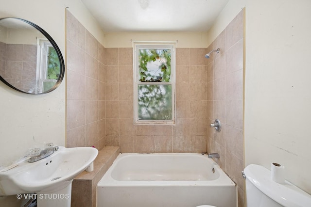 7545 S Rhodes Ave, Chicago, IL 60619 - bathroom featuring toilet and bathtub / shower combination