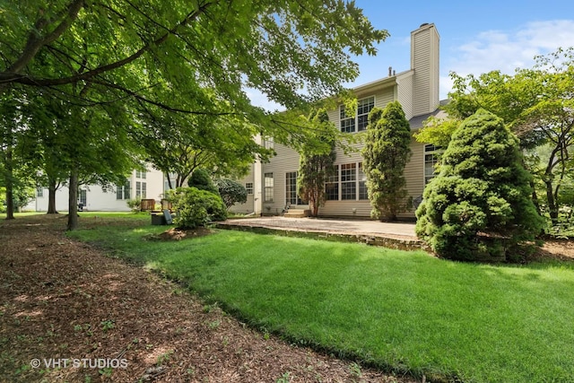 29583 N Birch Ave, Lake Bluff, IL 60044 - view of grassy yard featuring a patio area