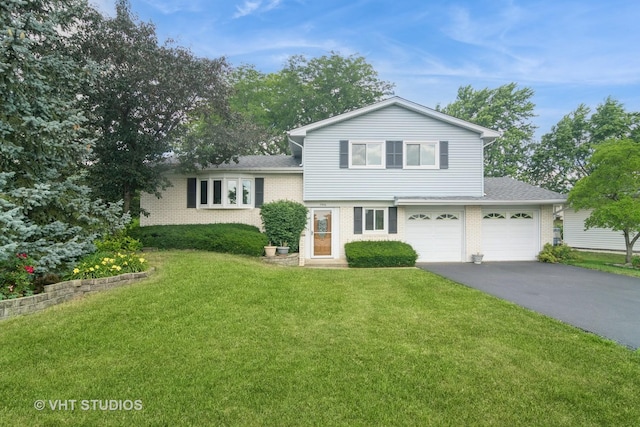 1406 Evans Ct, Elk Grove Village, IL 60007 - tri-level home featuring driveway, brick siding, a front yard, and a shingled roof