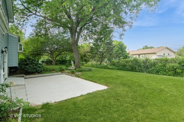 1406 Evans Ct, Elk Grove Village, IL 60007 - view of grassy yard featuring a patio