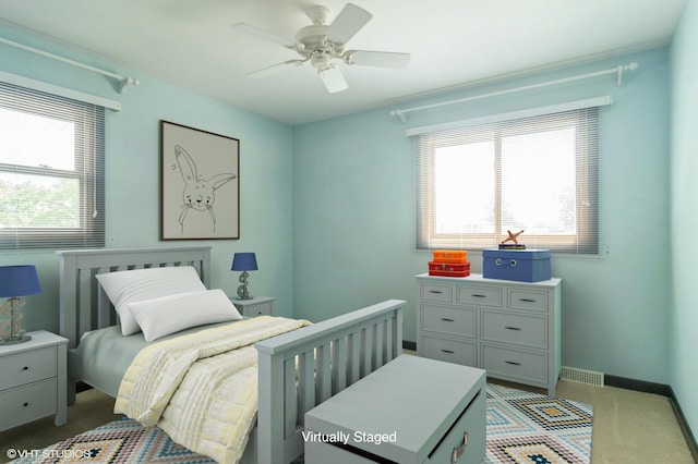 1406 Evans Ct, Elk Grove Village, IL 60007 - carpeted bedroom with a ceiling fan and baseboards