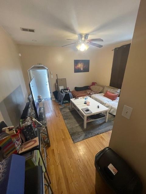 2620 W 24th St, Chicago, IL 60608 - living area featuring light wood-style flooring and ceiling fan