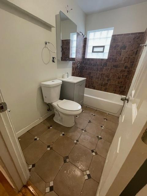 2620 W 24th St, Chicago, IL 60608 - bathroom with shower / bath combination, tile patterned flooring, and vanity
