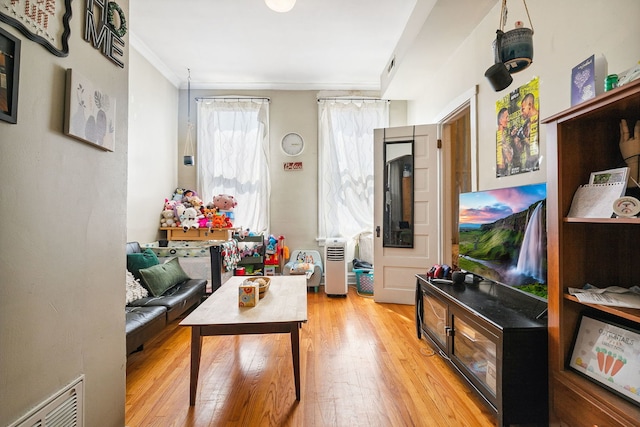 1624 N Oakley Ave, Chicago, IL 60647 - living room with light wood-type flooring and crown molding