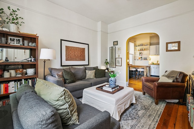 1624 N Oakley Ave, Chicago, IL 60647 - living room with arched walkways and wood finished floors