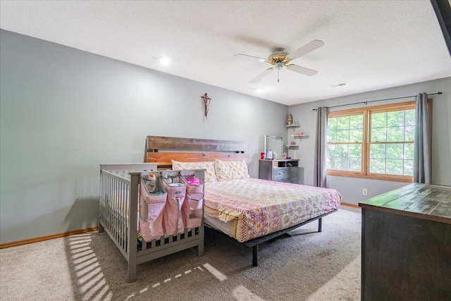 1311 Bancroft Dr, Bloomington, IL 61704 - carpeted bedroom with a ceiling fan and a textured ceiling