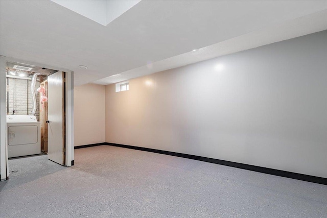 1311 Bancroft Dr, Bloomington, IL 61704 - basement featuring washer / dryer and baseboards