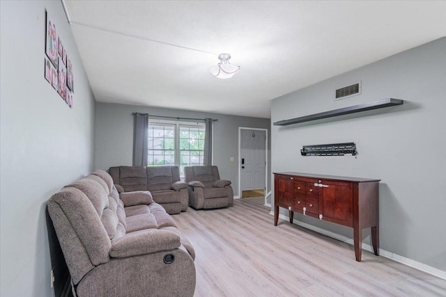 1311 Bancroft Dr, Bloomington, IL 61704 - living room featuring light wood-style flooring and baseboards