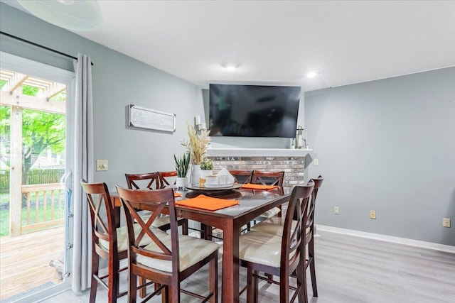 1311 Bancroft Dr, Bloomington, IL 61704 - dining room with light wood-style flooring and baseboards