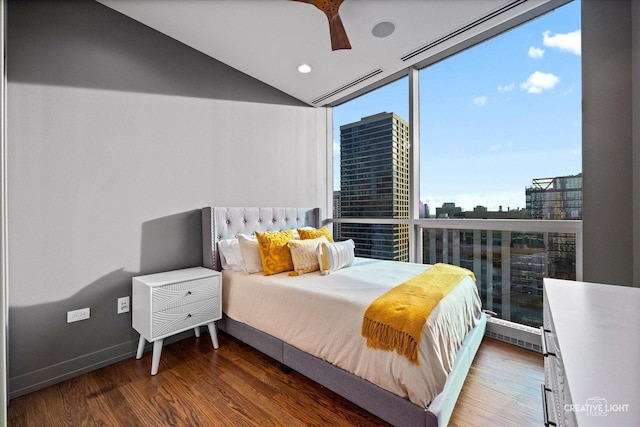 110 W Superior St Unit 1803, Chicago, IL 60654 - bedroom with a city view, wood finished floors, a wall of windows, recessed lighting, and vaulted ceiling