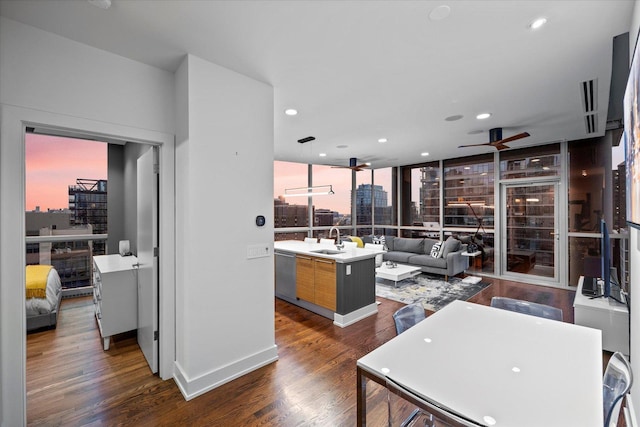 110 W Superior St Unit 1803, Chicago, IL 60654 - kitchen with dark wood-style flooring, dishwasher, a ceiling fan, light countertops, and recessed lighting