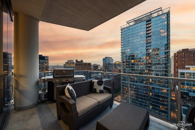110 W Superior St Unit 1803, Chicago, IL 60654 - balcony at dusk with a view of city and grilling area