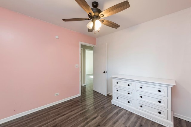 2302 Gilead Ave, Zion, IL 60099 - spare room with a ceiling fan and dark wood-style floors