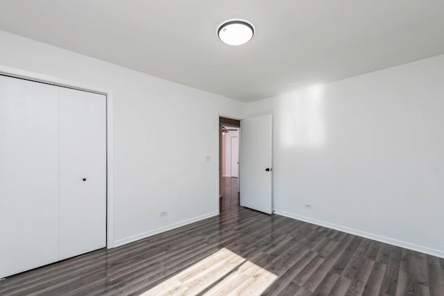 2302 Gilead Ave, Zion, IL 60099 - unfurnished bedroom with wood finished floors and a closet