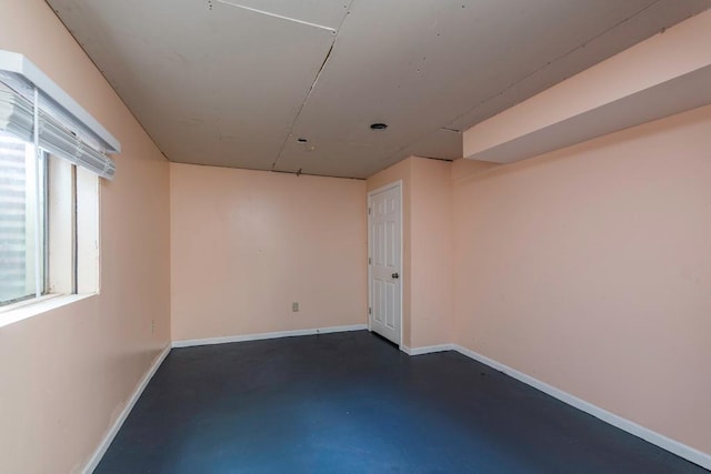 2302 Gilead Ave, Zion, IL 60099 - empty room featuring concrete floors and baseboards
