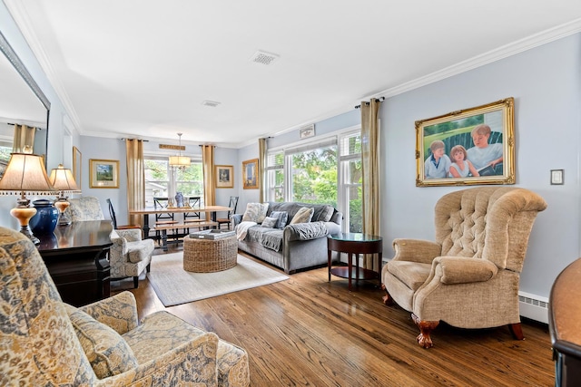 15 E Fairview St, Arlington Heights, IL 60005 - living room featuring wood finished floors, crown molding, and a baseboard heating unit