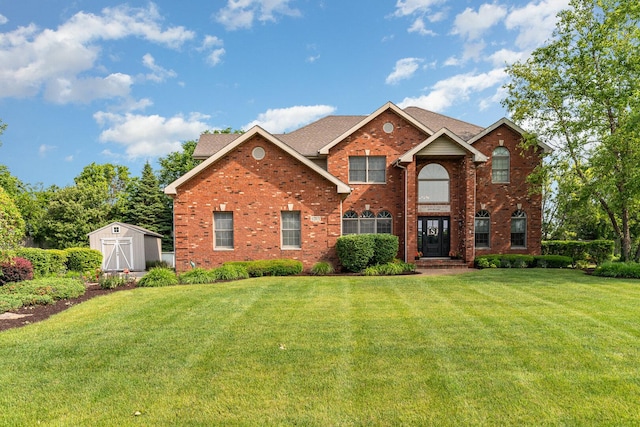 12114 W Castle Dr, Mokena, IL 60448 - traditional home with brick siding, a storage unit, a front lawn, and a shingled roof