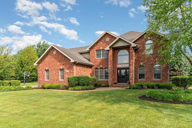 12114 W Castle Dr, Mokena, IL 60448 - traditional-style home with brick siding and a front yard
